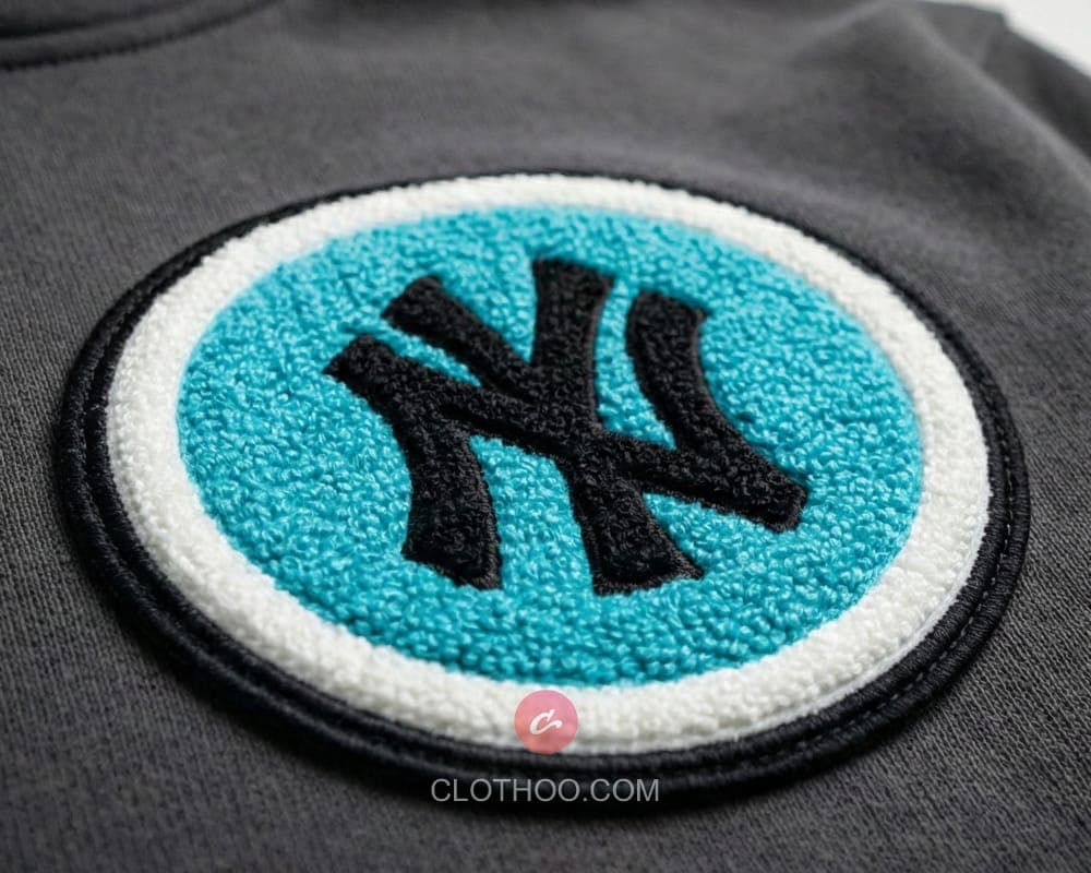 Chenille hoodie chest badge