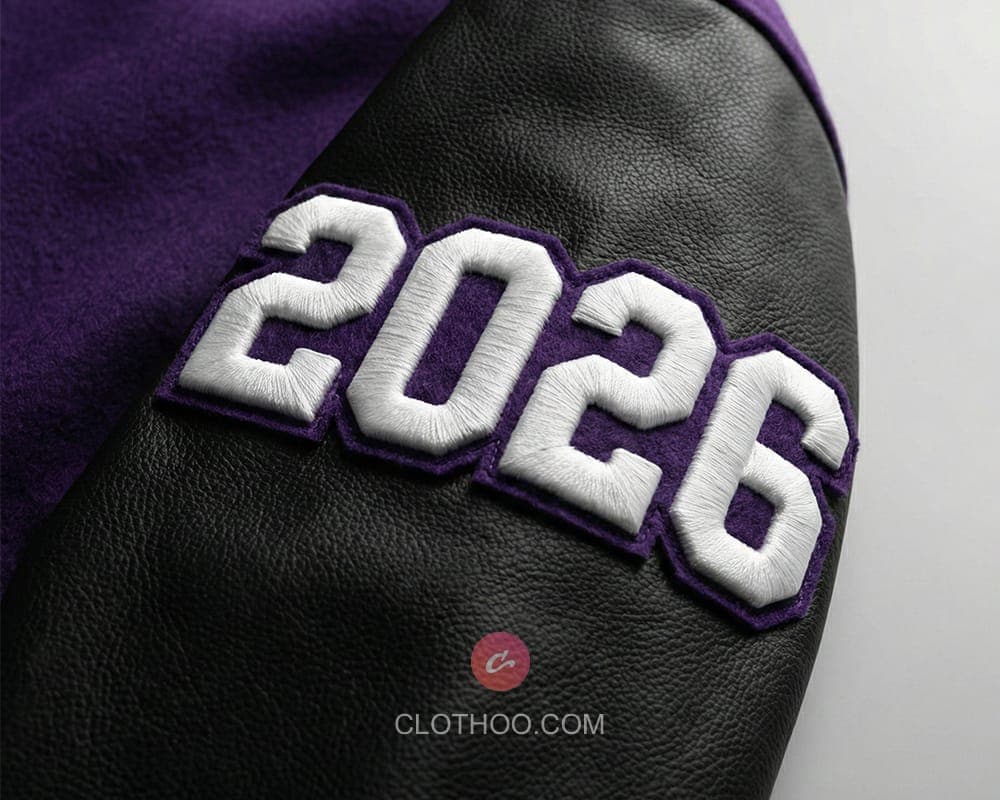 Raised year embroidery on sleeve