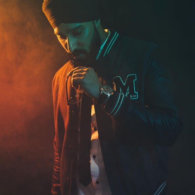 Artist Wearing Custom Letterman Jacket Clothaa